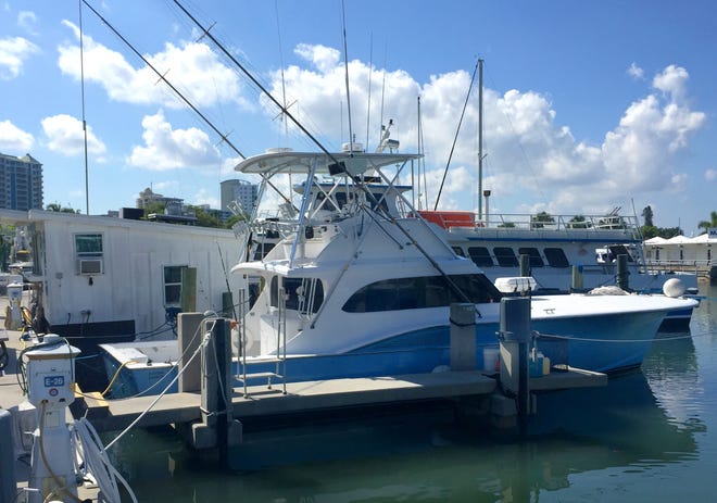 The charter fishing boat Double Marker, operated by Capt. Mark Bailey, docked at Marina Jack on Tuesday. [Herald-Tribune staff photo / Mike Lang]
