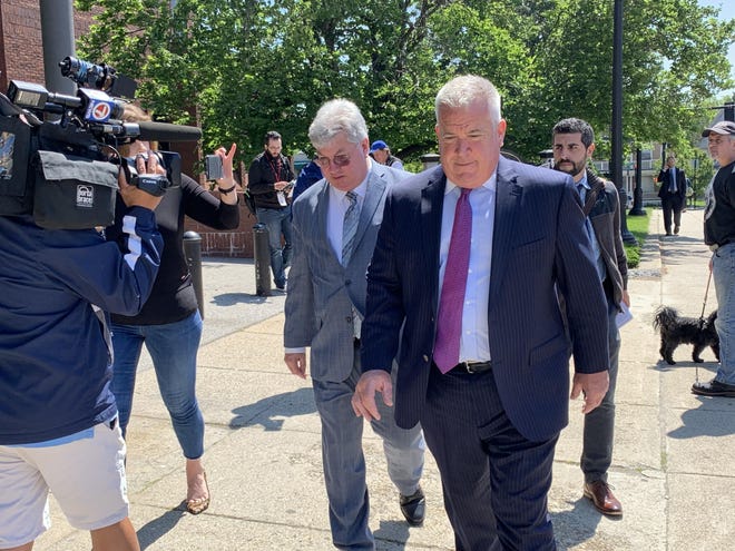 State Sen. Michael Brady, left, leaves Quincy District Court with his lawyer Jack Diamond Tuesday, June 4, 2019. Mary Whitfill/The Patriot Ledger