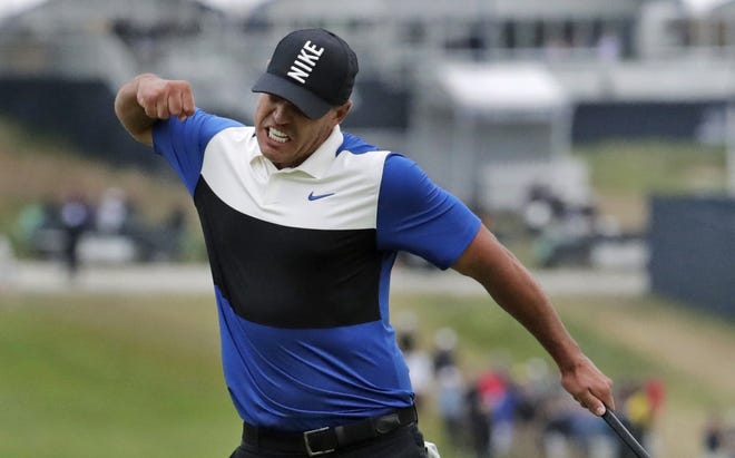 Brooks Koepka reacts after winning the PGA Championship on Sunday, May 19 at Bethpage Black in Farmingdale, N.Y. [AP Photo/Julio Cortez]