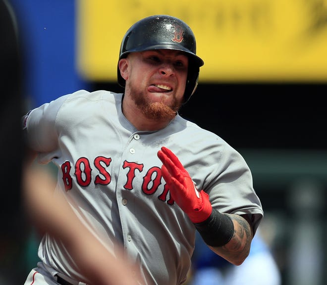 Boston Red Sox catcher Christian Vazquez runs the bases on a two-run triple during the seventh inning of Thursday's game against the Kansas City Royals at Kauffman Stadium. (AP Photo/Orlin Wagner)