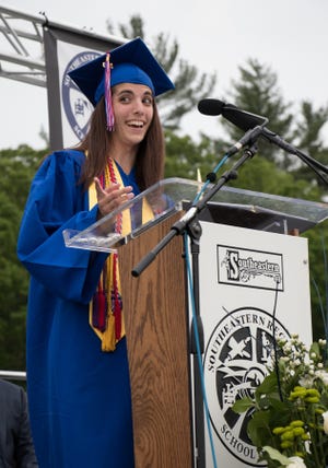 Jenna Goldberg, Stoughton, stepped to the podium for her Valedictorian Address. [Wicked Local Photo/Charlene A. McNeil]
