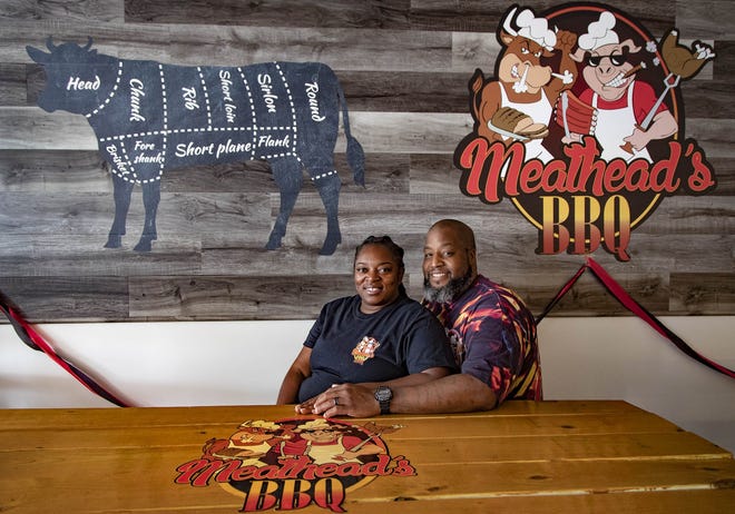 Shay and Marcel Hicks, owners of Meathead's BBQ, in their newly opened restaurant Wednesday in Royal Palm Beach. [ALLEN EYESTONE/palmbeachpost.com]