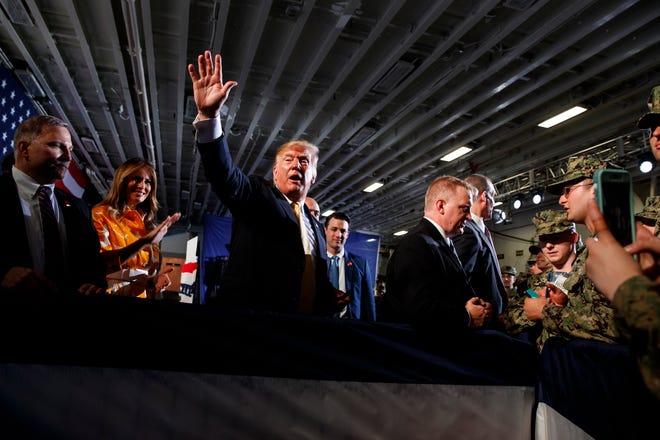 U.S. President Donald Trump talks with troops at a Memorial Day event aboard the USS Wasp amphibious assault ship May 28 in Yokosuka, Japan. [Evan Vucci/AP]