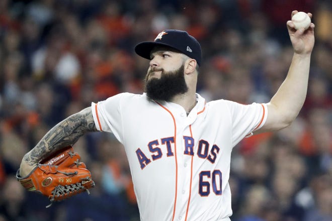 Houston Astros pitcher Dallas Keuchel throws against the Boston Red Sox during the American League Championship Series on Oct. 16, 2018, in Houston. [AP Photo/David J. Phillip, File]