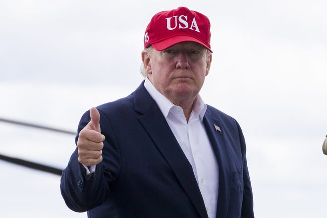 President Donald Trump gives thumbs up before departing Shannon Airport, on Friday in Shannon, Ireland. [AP Photo/Alex Brandon]