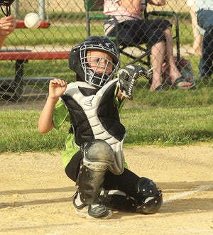 Superior Landscaping catcher Barrett Tissiere can’t quite snare a pitch during Rookie League play at the Rec-Plex on Thursday. Superior Landscaping played Wright’s Furniture in the early game.