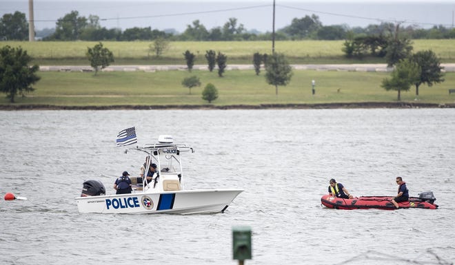 Pflugerville police and fire personnel on Monday were searching for a kayaker who was last seen Sunday night on Lake Pflugerville as severe storms blew through the area. [RICARDO B. BRAZZIELL/AMERICAN-STATESMAN]