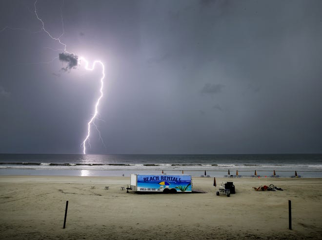 While thunderstorms rolled through the Daytona Beach area Sunday, a lightning bolt struck and killed a North Carolina motorcycle rider on Interstate 95. This bolt struck just off Daytona Beach Shores on Sunday. A lightning safety specialist said the first step of a lightning bolt travels at 300,000 mph. [Nigel Cook/GateHouse Media]