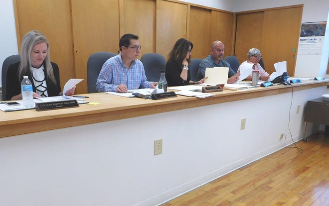 From left are Frankfort Village Trustees Colleen Bentley-Ciccone and James Caiola, Village Clerk Karlee Tamburro, Mayor Richard Adams and Trustee Peggy Maneen during Thursday's meeting of the Frankfort village board. The West Main Street Bridge in the village of Frankfort will be replaced, but not as soon as village officials had anticipated. [DONNA THOMPSON/TIMES TELEGRAM]