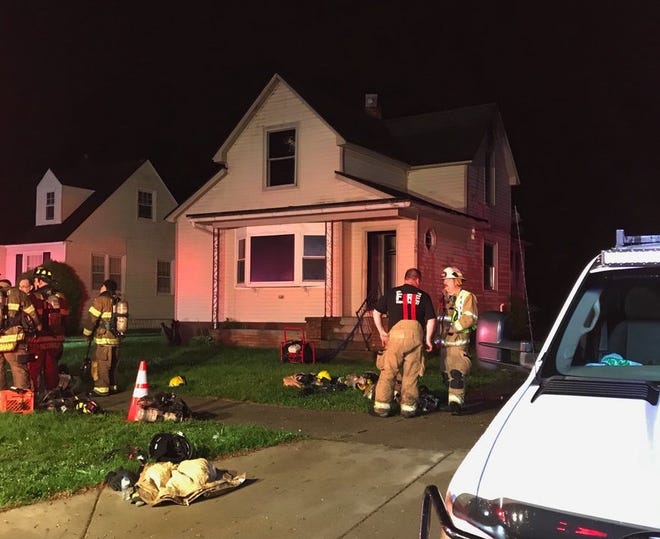 Holland fire and police units responded to a report of smoke emerging from a residential structure at 136 E. 19th St. early Monday morning. [Contributed]