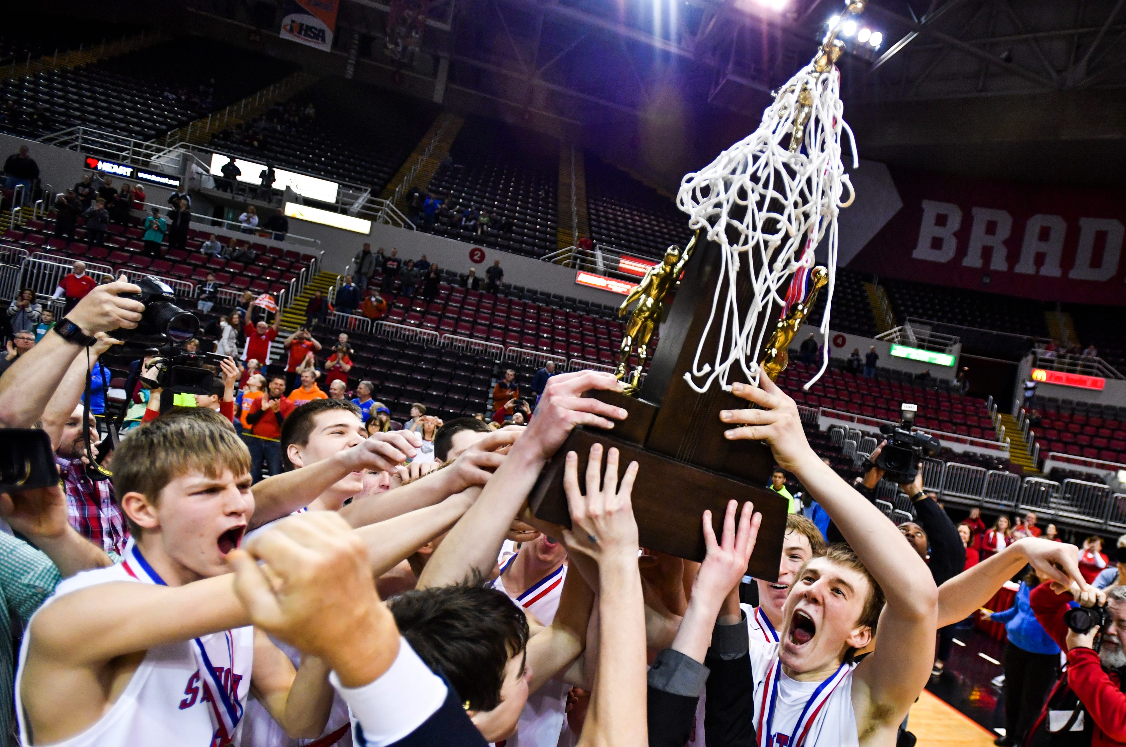 Eight champs, two weekends IHSA officially alters basketball state
