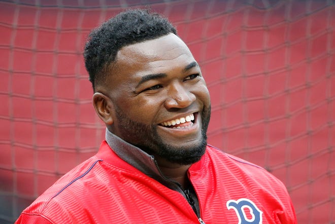 David Ortiz smiles during an April 2016 batting practice session with the Boston Red Sox. Sunday night, the 43-year-old was shot after being abmushed in the Dominican Republic. [MICHAEL DWYER/THE ASSOCIATED PRESS]