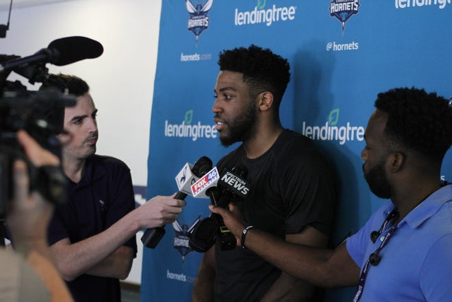 Former Gardner-Webb standout DJ Laster addresses the media following a workout with the Charlotte Hornets ahead of the upcoming NBA Draft. [Gardner-Webb Athletics photo]