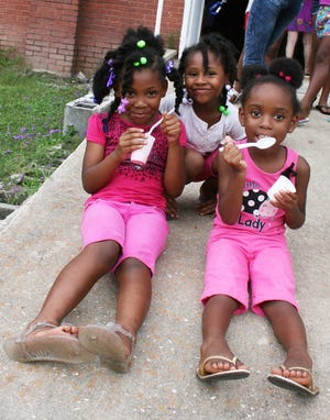 Guyton's ice cream social is a popular event. These girls enjoyed the free ice cream in 2015. [FILE PHOTO/EFFINGHAM NOW]