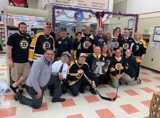 The staff at the Raynham Market Basket wore their Bruins gear in support of their team in advance of Wednesday night's Stanley Cup championship game.