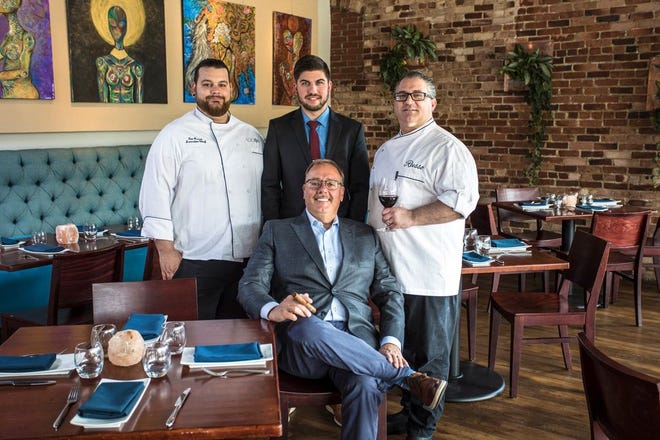 Left to right standing - Executive Chef Tim Russo, GM Tommy Studer, Chef Marco Salerno. seated Owner Ed Russo. Courtesy photo