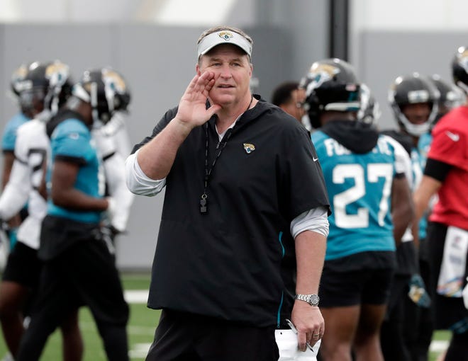 Jacksonville Jaguars head coach Doug Marrone directs an NFL football practice, Thursday, June 13, 2019, in Jacksonville, Fla. (AP Photo/John Raoux)