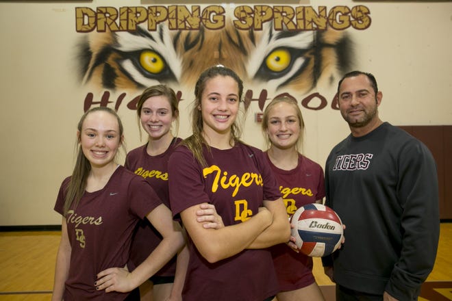 From left, Madi Burkholz, Sarah Nading, Avery Kalsu, Mackenzie Murray and coach Michael Kane of Dripping Springs helped the volleyball team reach the 2018 state tournament. The school finished second in the UIL's Class 5A Lone Star Cup standings. [Jay Janner/American-Statesman]