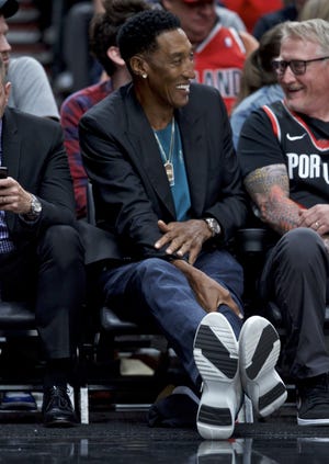 Scottie Pippen sits courtside during the second half of Game 3 of the NBA basketball playoffs Western Conference finals between between the Portland Trail Blazers and the Golden State Warriors Saturday, May 18, 2019, in Portland, Ore. The Warriors won 110-99. (AP Photo/Craig Mitchelldyer)