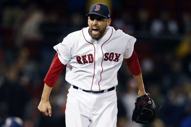 Boston Red Sox relief pitcher Matt Barnes reacts after striking out the Texas Rangers' Danny Santana during the eighth inning at Fenway Park Thursday night. (AP Photo/Michael Dwyer)