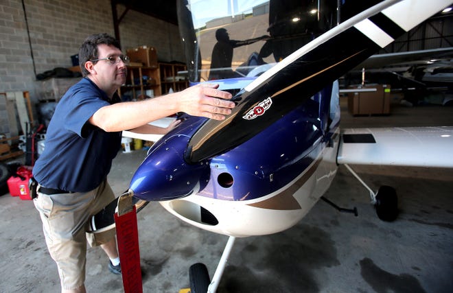 Andy Porter prepares a plane for flight at Shelby-Cleveland County Regional Airport on Tuesday. The airport will host a fly-in for the community this Saturday. [Brittany Randolph/The Star]