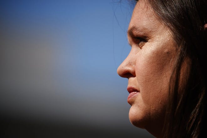 In this Friday, May 31, 2019, file photo White House press secretary Sarah Sanders talks to reporters outside the White House in Washington. Sanders is expected to leave her post at the White House by the end of the month, but may run for governor in Arkansas. [AP Photo/Evan Vucci, File]
