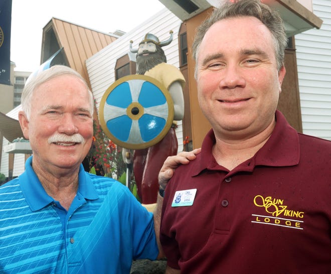 Gary Brown, left, owner of the Sun Viking Lodge in Daytona Beach, and his son Greg Brown, the hotel's general manager, have mixed work and family life for decades. “It has been a really good relationship,” said Gary Brown. “We’re a lot alike.” [News-Journal/David Tucker]