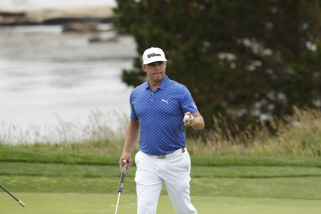 Gary Woodland carded a 2-under 69 on Saturday to carry a one-shot lead over Justin Rose into the final round at the US Open. Woodland will make his first appearance in a final round at a major Sunday. [AP PHOTO/MATT YORK]