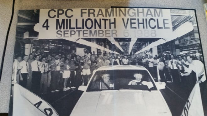 Employees at the Framingham GM plant celebrate the 4 millionth vehicle coming off the line in 1988.

[Contributed photo]