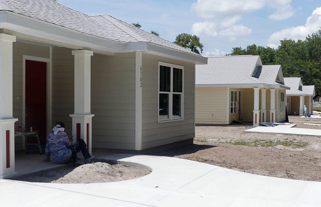 Three of the four homes are nearing completion in Coleman, which will serve as a blueprint for the homes to be built at Tavares Cottage Community. [Linda Florea/Correspondent]