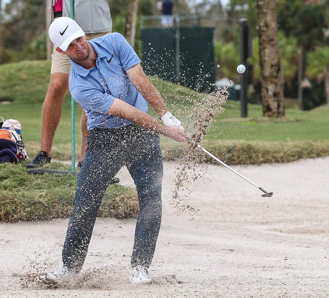 Denny McCarthy hits out of a bunker onto the 17th green during the final round of the Web.com Tour Championship at the Atlantic Beach Country Club in 2017. McCarthy won the event last year. The tour will be known as the Korn Ferry Tour beginning on Wednesday. [Gary Lloyd McCullough/For the Times-Union[.