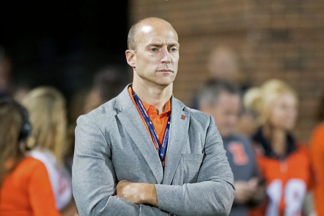 Illinois athletic director Josh Whitman watches from the sideline during a 2017 football game. [AP Photo/Bradley Leeb]