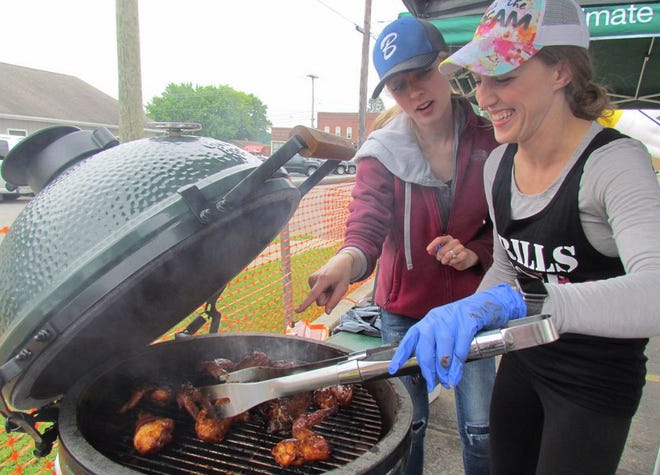 Deborah Davis and Kendra Ackerman of the Grills Gone Wild team, received first place in the chicken-grilling category Saturday at “Magic City Egg Fest” in Colon.
