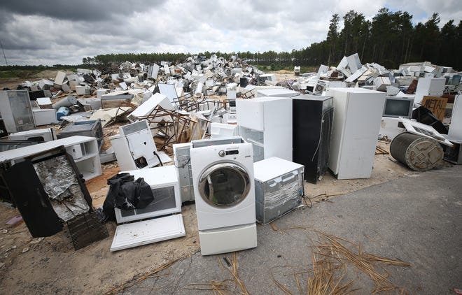 Household appliances, many of which were damaged during Hurricane Michael, await sorting on Tuesday at Steelfield Landfill. The Bay County Commission approved an $18.4 million expansion of the landfill to accommodate hurricane debris. [PATTI BLAKE/THE NEWS HERALD]