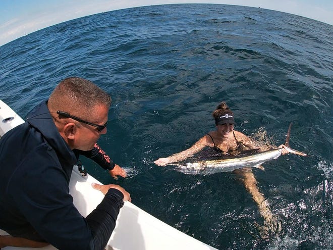 Sierra Nichols landed her first sailfish while fishing last weekend with Capt. Steve Mullen. [Steve Mullen, Fish Hunter Charters]