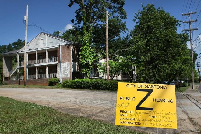 A zoning change approved Tuesday night will clear the way for the Grier Apartments to be razed in favor of a new 7-Eleven gas station and convenience store where South New Hope Road meets Garrison Boulevard. [John Clark/The Gaston Gazette]