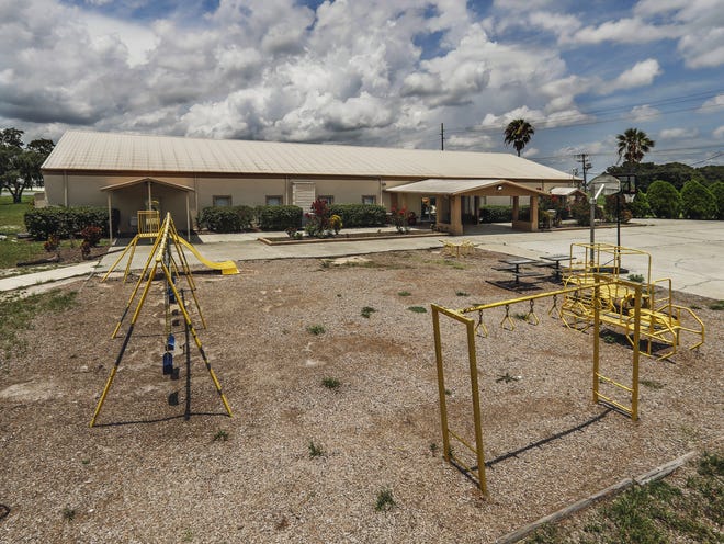 Kingdom Preparatory School in Auburndale sits vacant Wednesday. The school apparently closed permanently in May, three months after its headmaster and football coach, Charles “Pastor Tiger” Aguon, was arrested and charged with lewd molestation of a 15-year-old boy. [PIERRE DUCHARME/THE LEDGER]