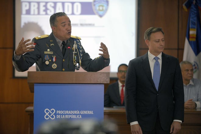 In this file photo, the director of the National Police, General Ney Aldrin Bautista Almonte, accompanied by the Attorney General of the Republic, Jean Alain Rodri­guez, right, speaks during a press conference about the persons detained in relation to the attack on former Boston Red Sox slugger David Ortiz at the Attorney General's Office in Santo Domingo, Dominican Republic on June 12, 2019. [AP File Photo/Roberto Guzman]