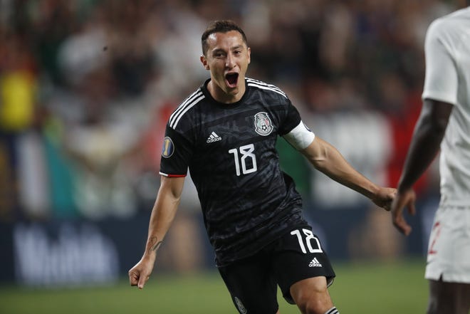 Mexico's Andres Guardado shouts in joy after scoring a goal against Canada during the second half of a CONCACAF Gold Cup soccer match Wednesday night in Denver. Mexico won 3-1. [David Zalubowski/The Associated Press]