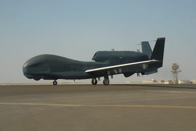 In this Feb. 13, 2018, photo released by the U.S. Air Force, an RQ-4 Global Hawk is seen on the tarmac of Al-Dhafra Air Base near Abu Dhabi, United Arab Emirates. Iran's Revolutionary Guard shot down a U.S. RQ-4 Global Hawk on Thursday, June 20, 2019, amid heightened tensions between Tehran and Washington over its collapsing nuclear deal with world powers, American and Iranian officials said, though they disputed the circumstances of the incident. (Airman 1st Class D. Blake Browning/U.S. Air Force via AP)