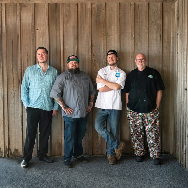 Team Island members, from left, Nick Massie, mixologist, Blackfly - The Restaurant; Chef Ben Loose, Gas Full Service Restaurant; Chef Chip Richard, Cap's On The Water; and Chef Bob Henle, The Reef Restaurant. (Contributed photo)