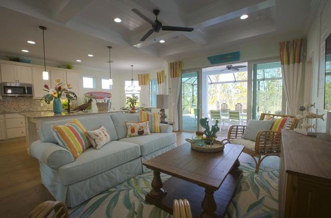 As of early 2018, more than 100,000 peole already had expressed an interest in buying a home at Lattitude Margaritaville in Daytona upon which the development in the Panhandle is based. This shows a living room in the "Coconut" model home in Daytona. BRIAN ADAMS | WASHINGTON POST FILE