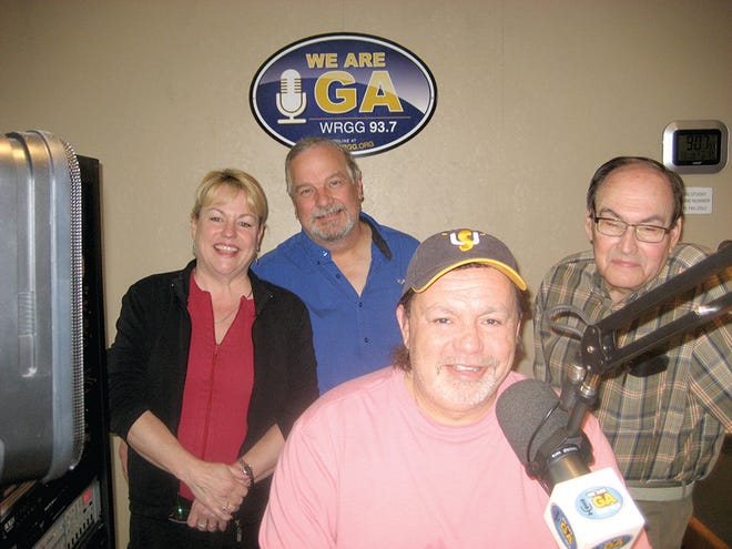 On Tuesdays, Mary Bock joins her husband Mike, back, and Greg Hoover, front, on WRGG's "The Morning Show." They're shown with Wade Burkholder, president of Good Companion Radio and development director for the nonprofit community radio station. SHAWN HARDY/ECHO PILOT