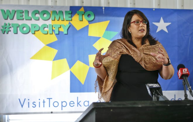 Topeka Mayor Michelle De La Isla announces during a news conference Thursday at Heartland Motorsports Park that Country Stampede's name will change to Heartland Stampede and the three-day music festival will remain in Topeka permanently. [Chris Neal/The Capital-Journal]