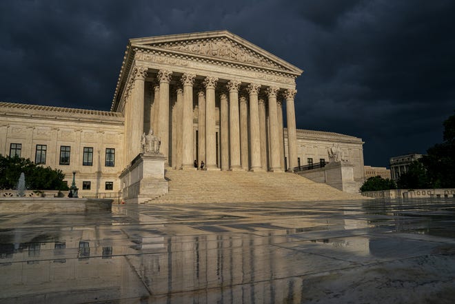 The Supreme Court is seen under stormy skies in Washington, Thursday, June 20, 2019. [AP Photo/J. Scott Applewhite]