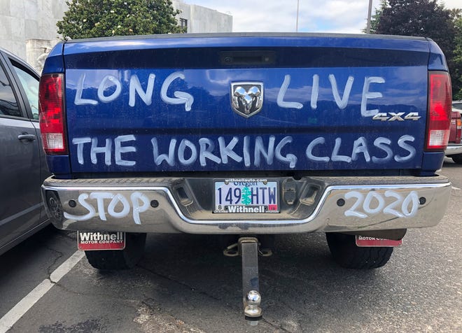 A diesel truck that belongs to a self-employed logger is parked in Salem, Ore., on Thursday, June 20, 2019, the day the Senate is scheduled to take up a bill that would create the nation's second cap-and-trade program to curb carbon emissions. Senate Republicans, however, pledged to walk out so there wouldn't be enough lawmakers present for a vote on House Bill 2020, which is extremely unpopular among loggers, truckers and many rural voters. (AP Photo/Gillian Flaccus)