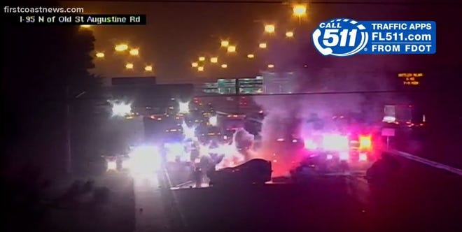 A traffic camera shows a vehicle on fire on Interstate 95, the result of a wrong-way crash that killed two people including a St. Augustine woman. [FIRST COAST NEWS]