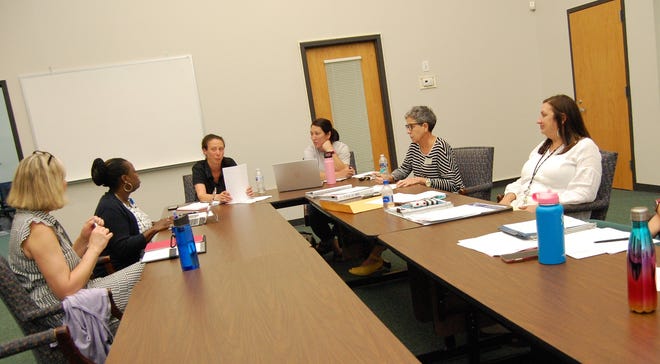 Members of the New Hanover County Board of Educations' Title IX Committee met Monday to discuss draft changes to the board's discrimination, harassment and bullying policy. [CAMMIE BELLAMY/STARNEWS]