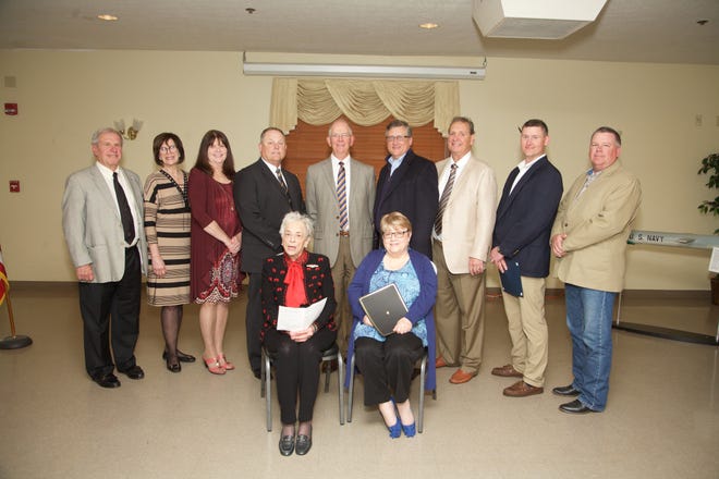 The Dover Historical Society recently inducted a class of five individuals into its Hall of Distinction. Pictured, from left, standing, are Jim Render, June Contini, Susie Hunt, Jud Compton, Kevin Keffer, Dave Hanhart, Jon Mason, Jim Gill and Ken Lab; seated, Nancy Yockey Bonar and Patty Feller. PHOTO PROVIDED
