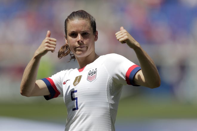 "This team has always been good at compartmentalizing. We focus on the task at hand," U.S. defender Kelley O'Hara said as news about lawsuit mediation broke amid the Women's World Cup. [Julio Cortez/The Associated Press]